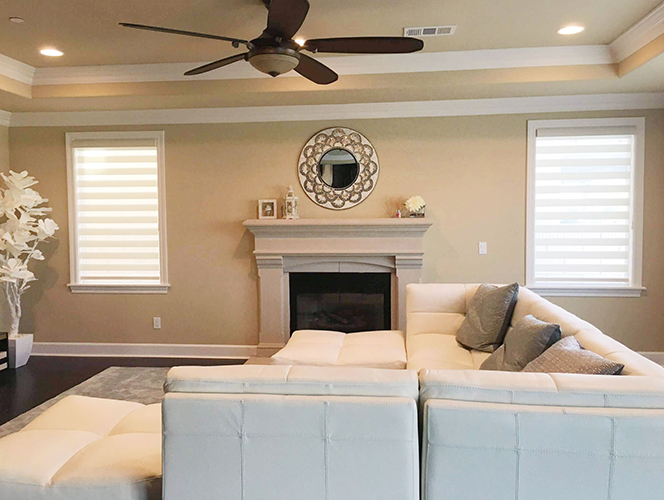 Your living room should be a place to relax, not a place to squint at the TV because the Arizona sun is shining right in your eyes!

The right window treatments can help reduce glare, add privacy, and make your space feel more finished.

Plantation shutters offer a timeless look with adjustable light control, while roller shades and solar shades are great options for a clean, modern style.

Every home is different, so it helps to consider your window direction, sunlight, and how you use the room.